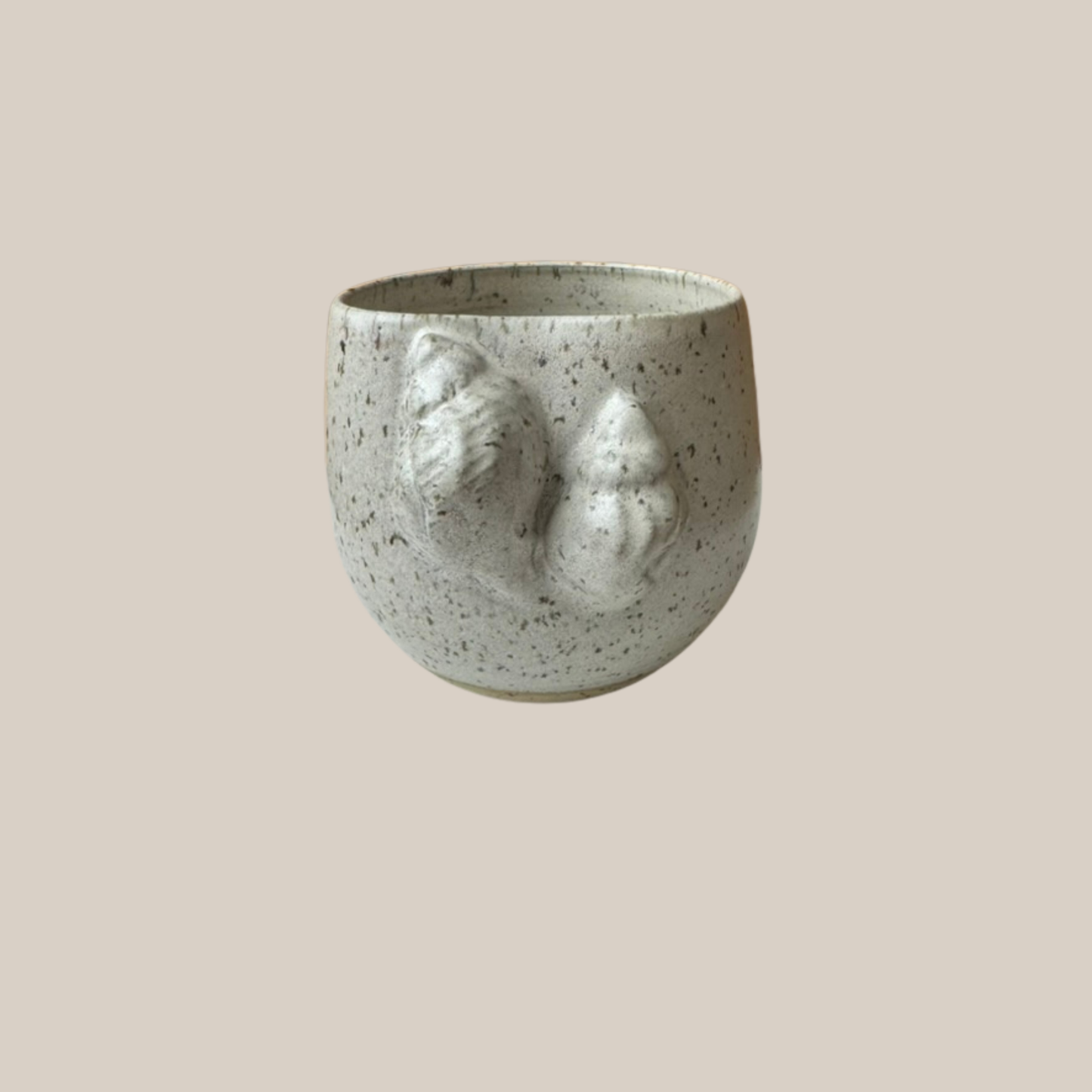 Beige keramik kop Konkylier