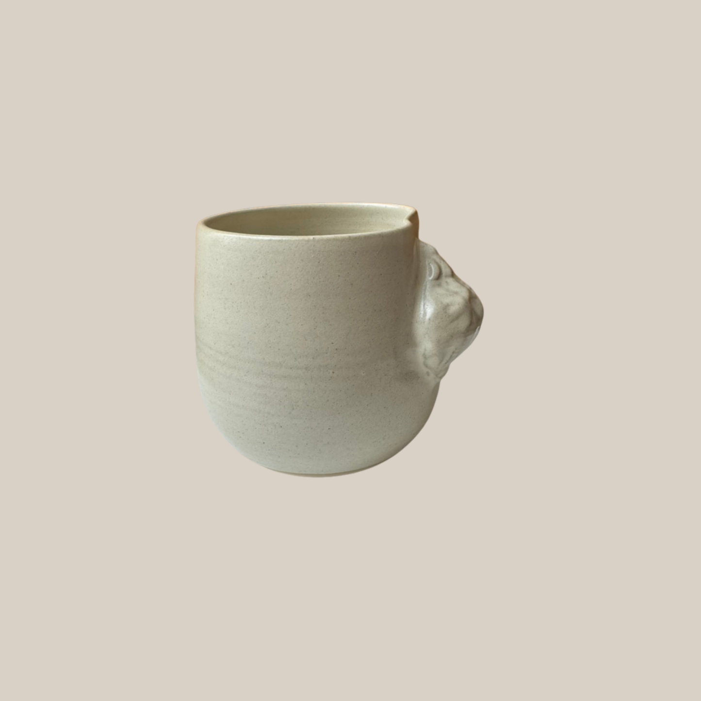 Beige keramik kop Konkylier