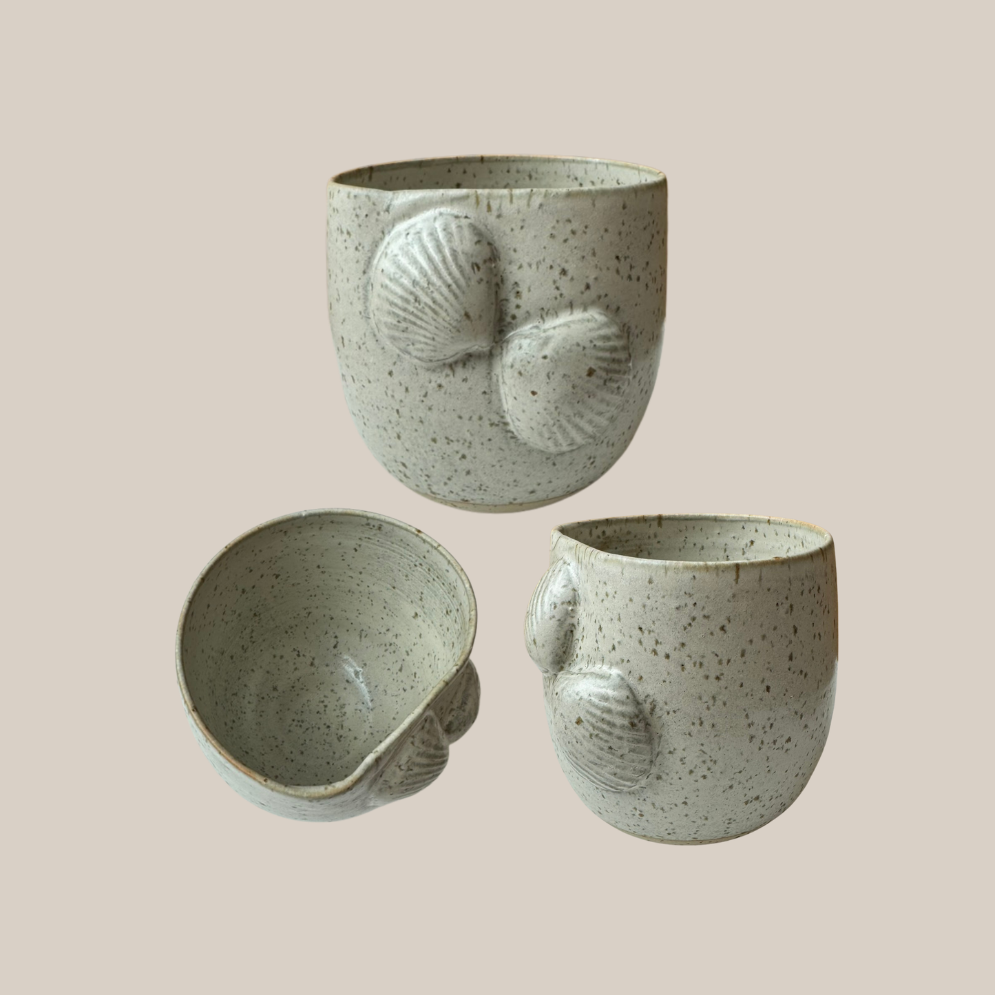 Beige keramik kop musling