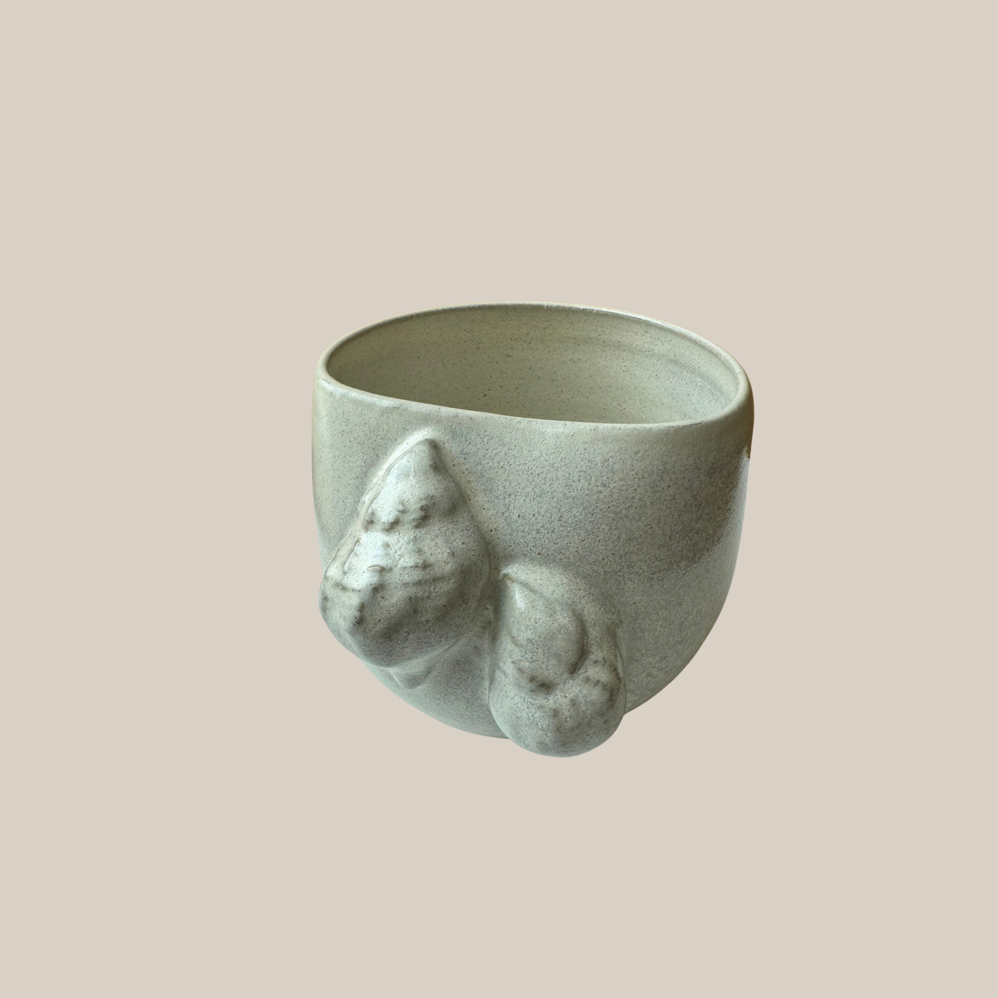 Beige keramik kop Konkylier