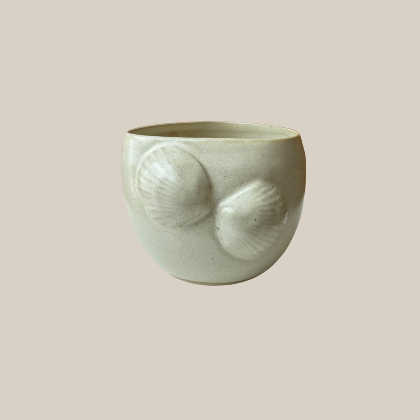 Beige keramik kop musling