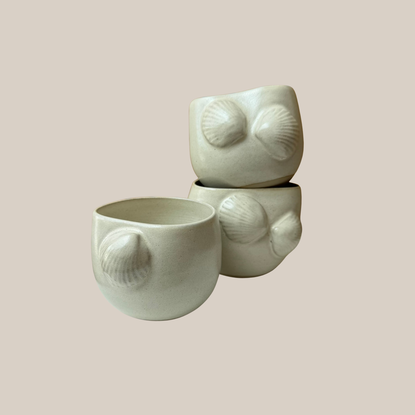 Beige keramik kop musling