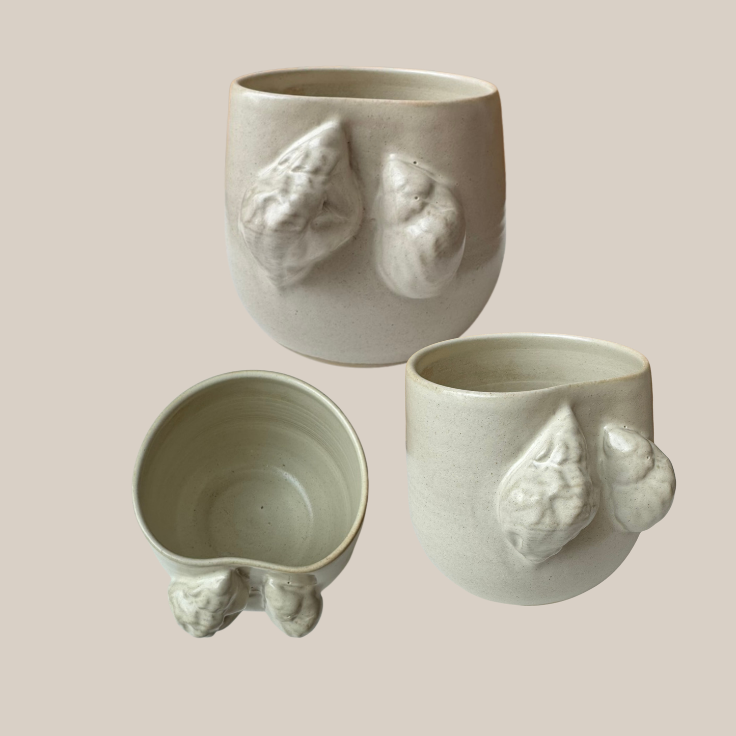 Beige keramik kop Konkylier