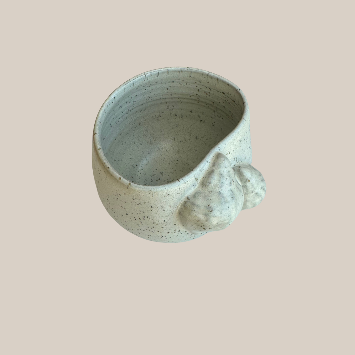 Beige keramik kop Konkylier