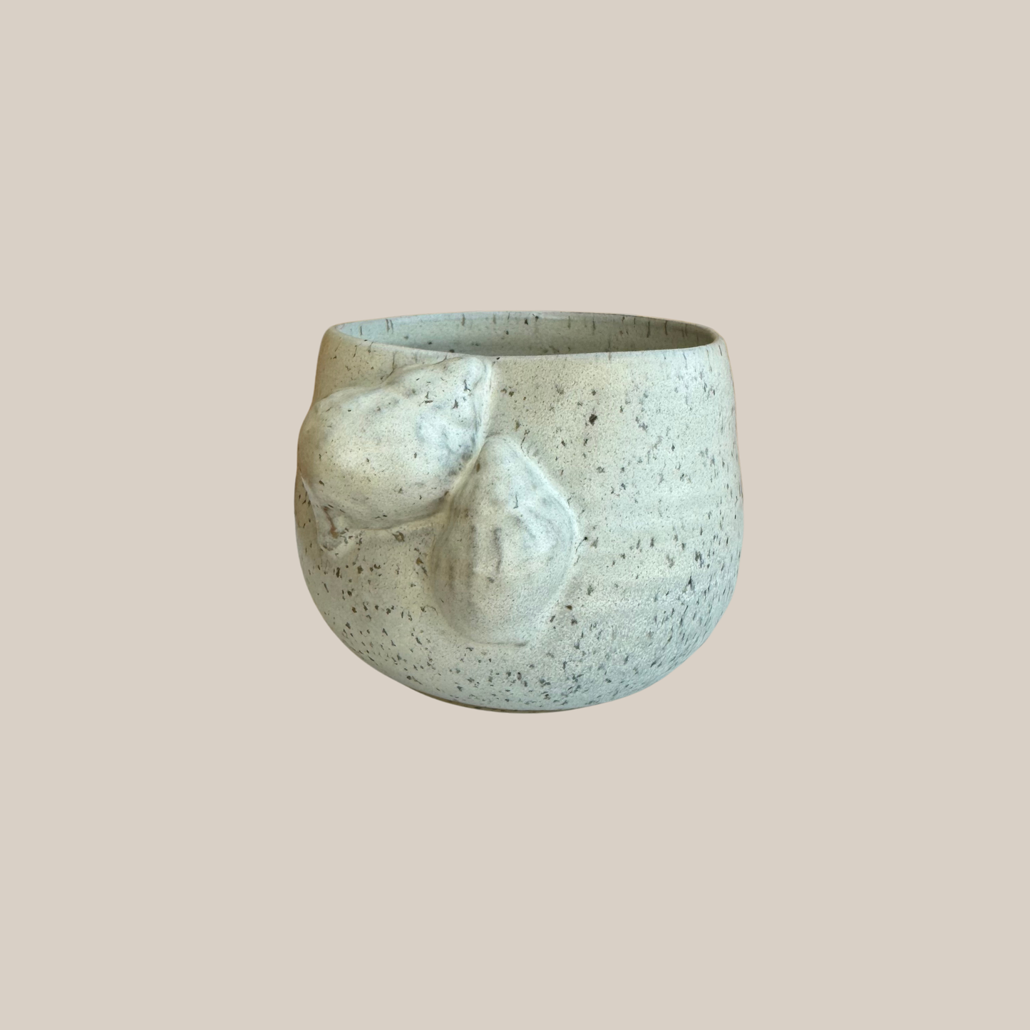 Beige keramik kop Konkylier
